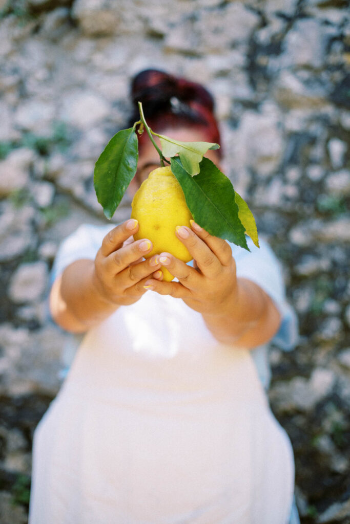 woman holding Amalfi lemon