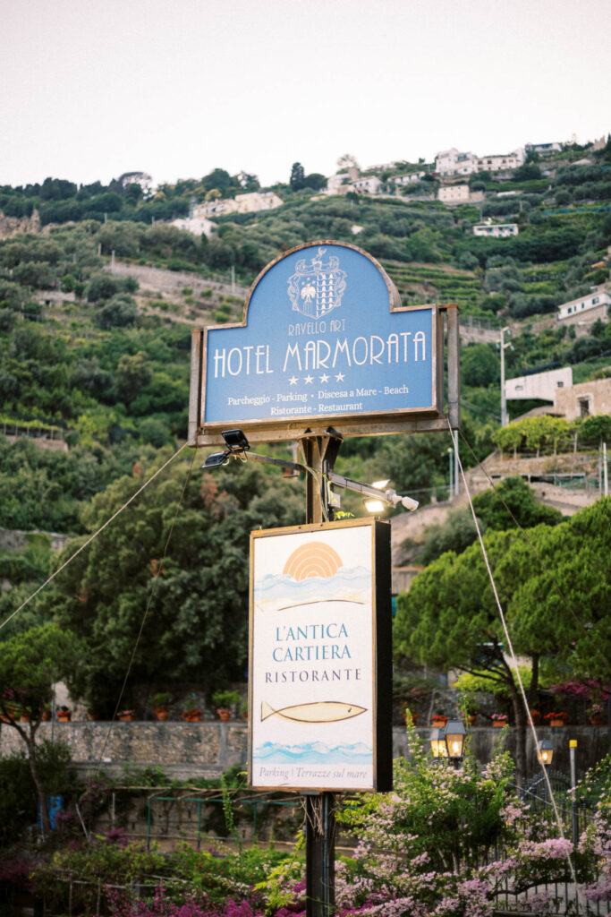 A sign for Hotel Marmorata and the hotel's restaurant, L'Antica Cartiera.
