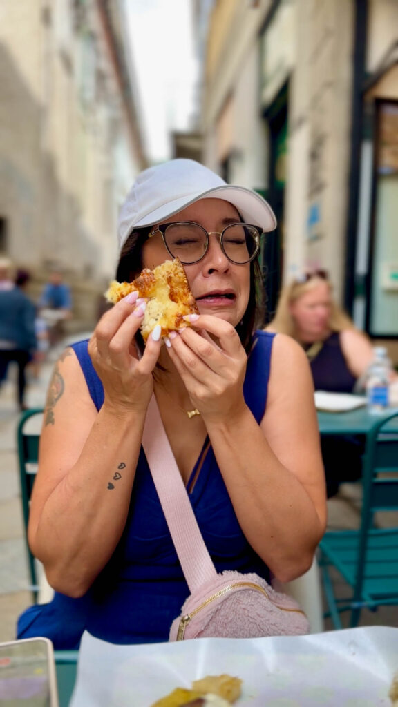 woman eating pizza in Italy2