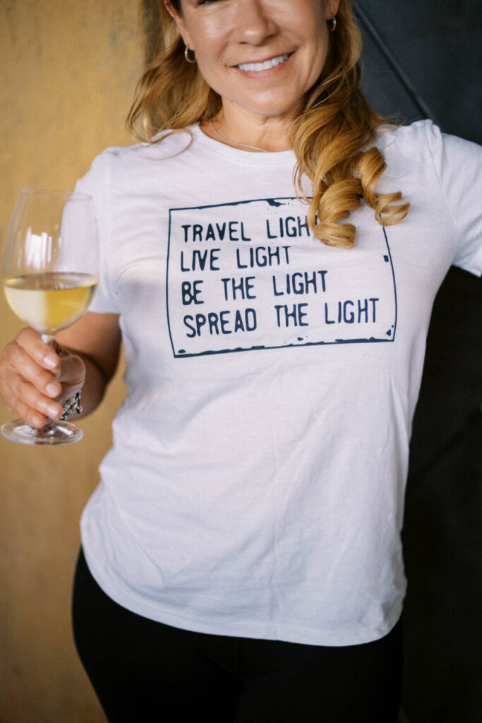 a woman enjoying Italian wine