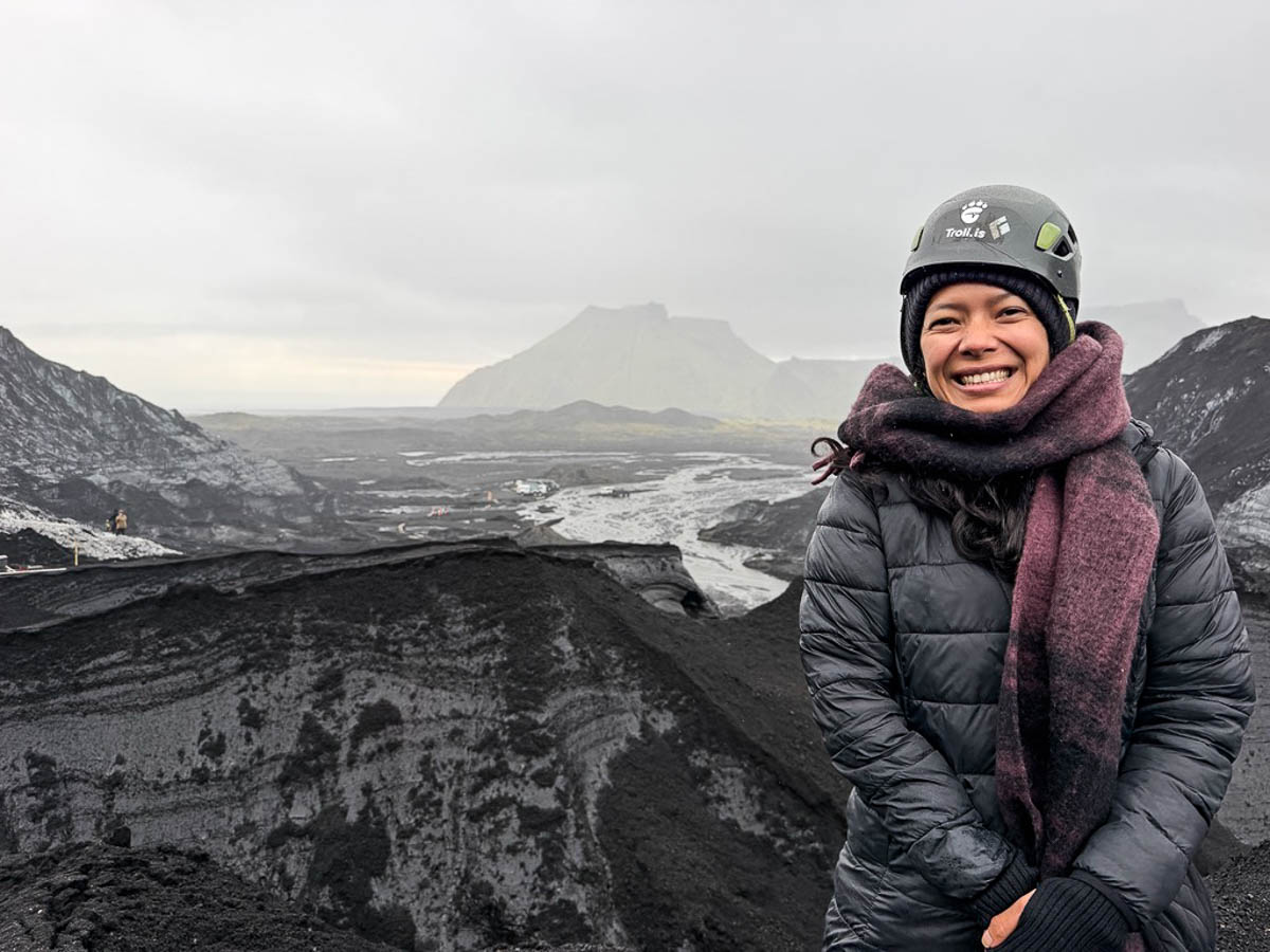 Toni smiling in a helmet on Sólheimajökull glacier