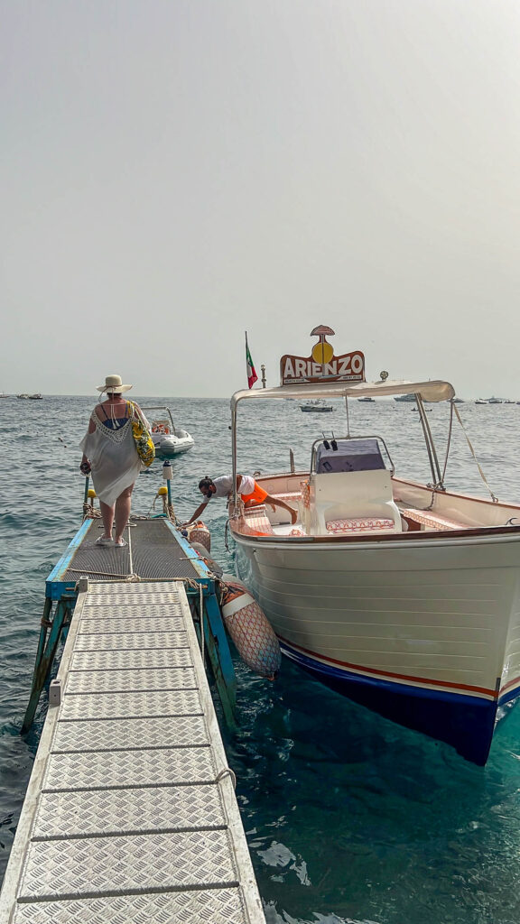 The Arienzo Beach Club shuttle boat waiting at the pier.