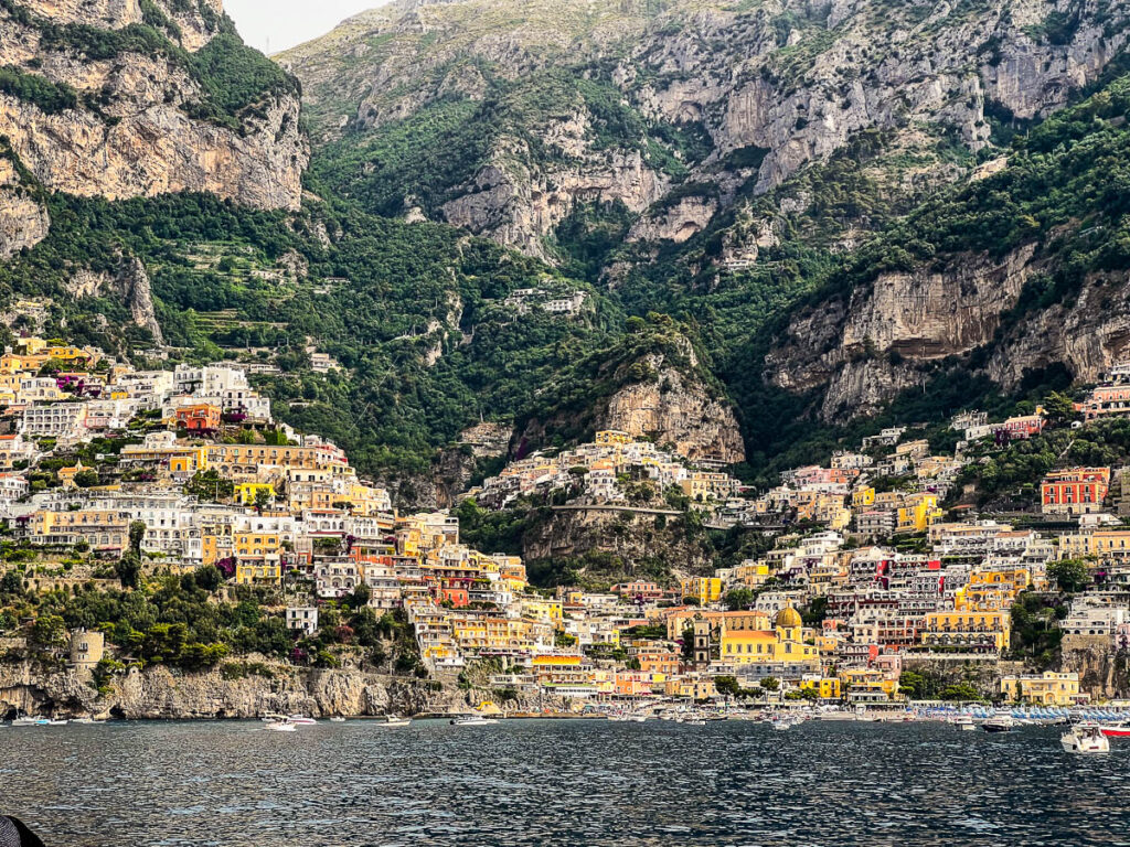 Positano spread across the hillside, seen from the morning ferry.
