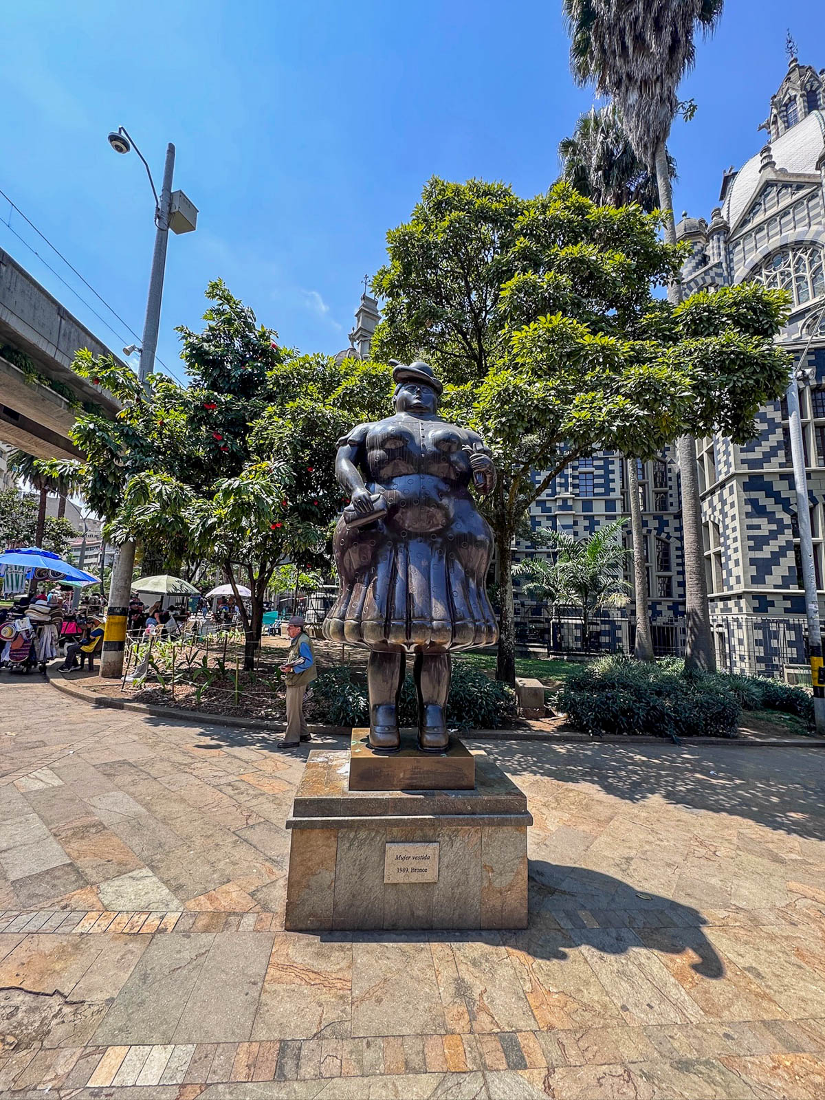 Fernando Botero bronze sculpture of a woman in a plaza in downtown Medellín