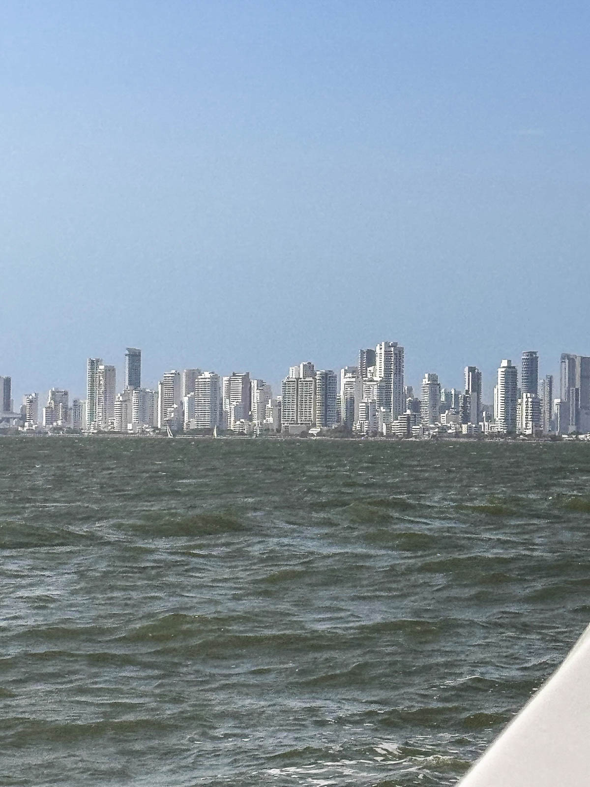 Cartagena's high rise skyline seen across the water from our boat