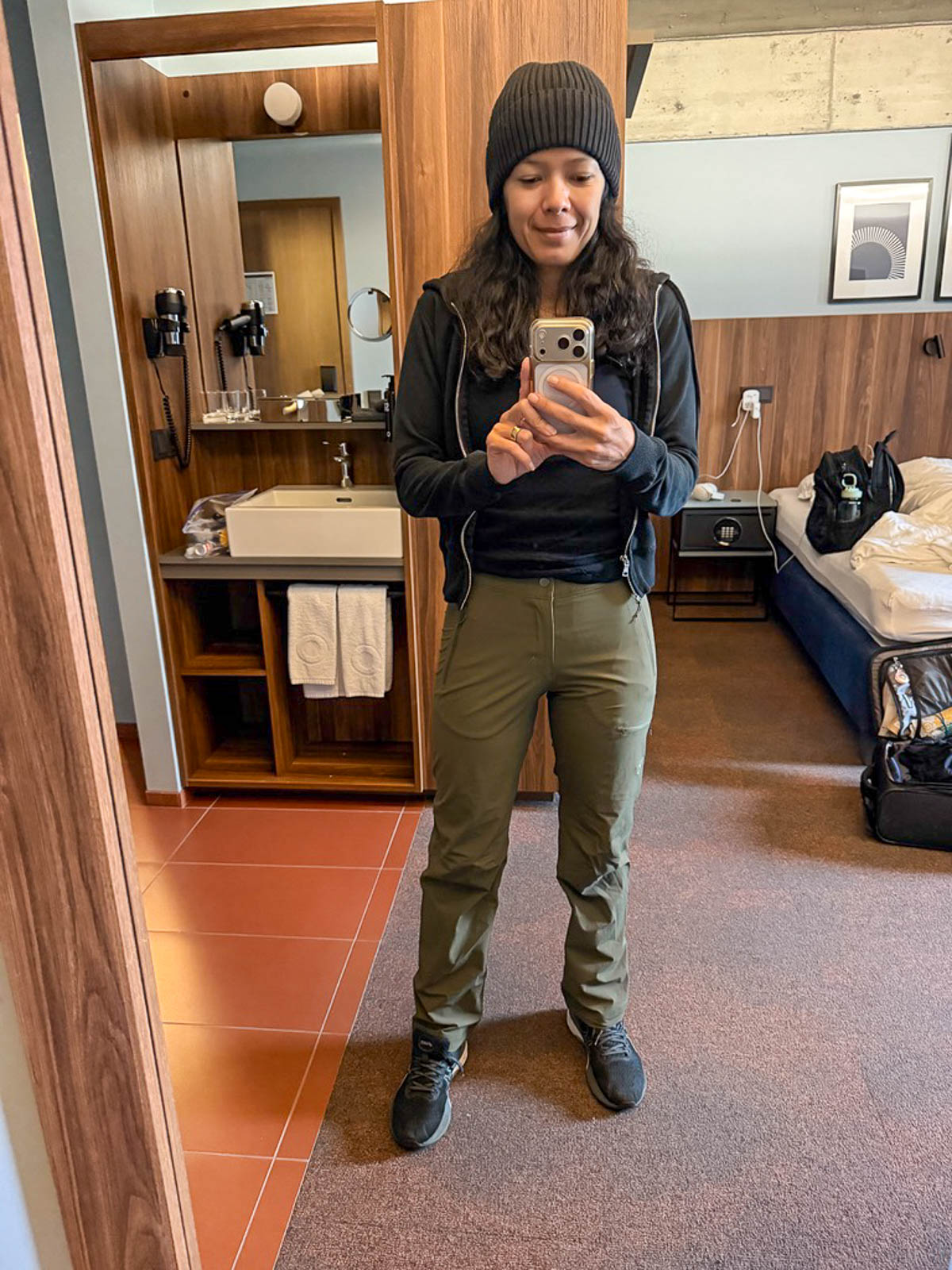 Toni taking a mirror selfie in her hotel room in Iceland