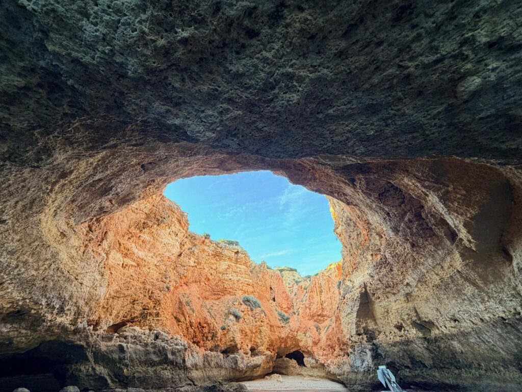 Looking up through the opening in the roof of the Benagil Cave in the Algarve