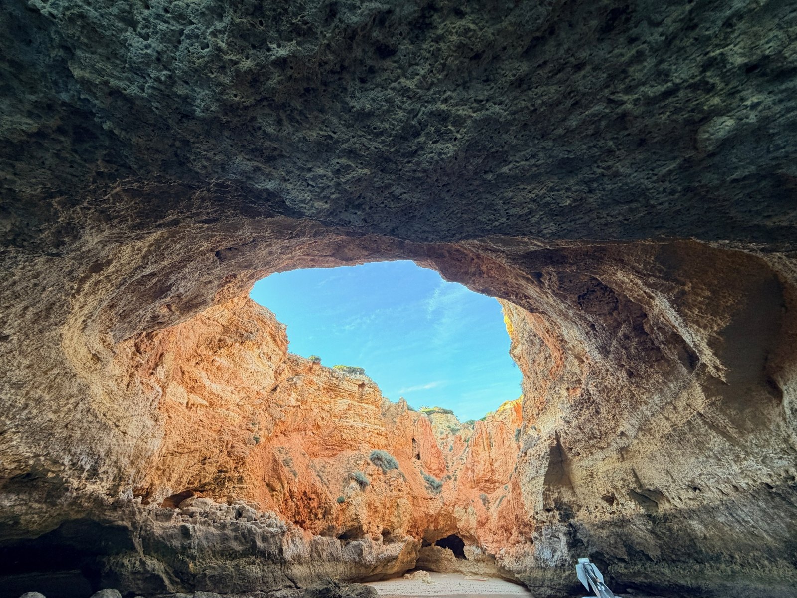 Looking up through the opening in the roof of the Benagil Cave in the Algarve