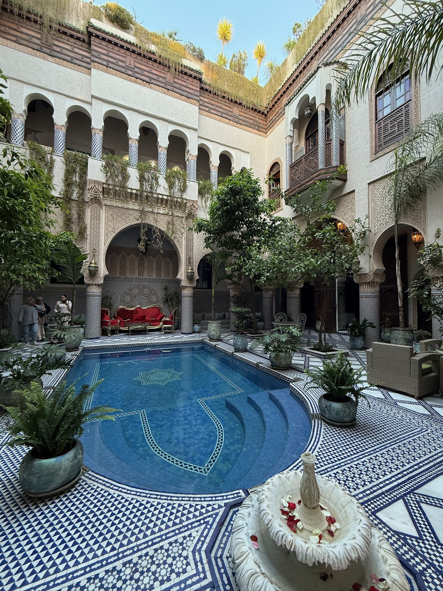 Mosaic-tiled pool in the courtyard of Riad Salam Fes