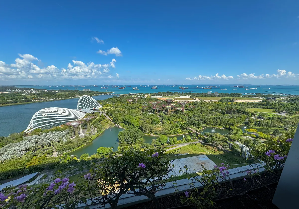 View from our Marina Bay Sands room over Gardens by the Bay and its glass conservatories, with the sea beyond